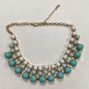 Blue and gold statement necklace.